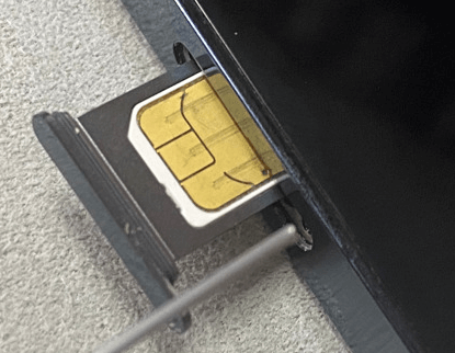 Remove the SIM card and put it back in